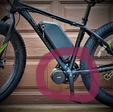 Showing a picture of a mid-motor in a bicycle frame.